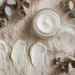 Moisturizer jar and cream swatches on a neutral background
