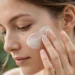 Person applying a gentle facial exfoliating product